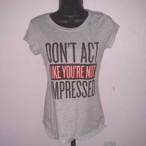 "Dont Act Like You're Not Impressed" grey t-shirt